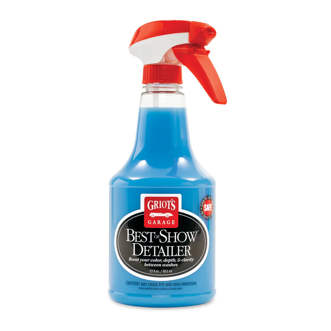 A bottle of Griot's Garage Best Show Detailer spray, featuring a bright blue liquid inside a clear plastic bottle with a red and white trigger sprayer and a black and red label.